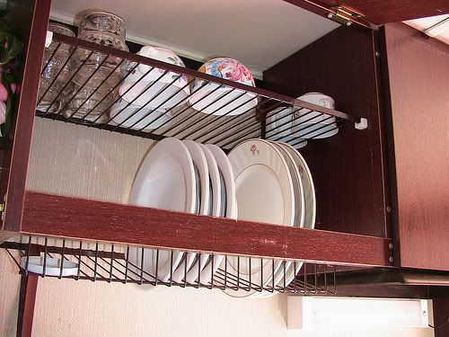 Drying Racks Above Sink Inside Kitchen Cabinet. Hidden Cabinet -   Finland