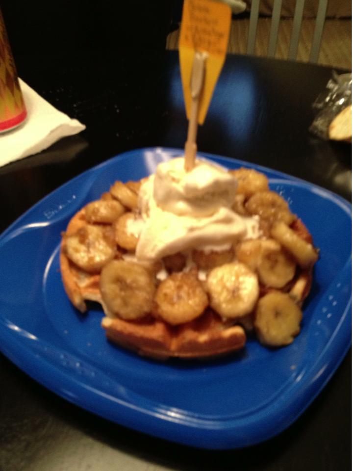 A Laura and Mike's Brown sugar and bourbon glazed bananas w ginger ice cream on a crispy waffle